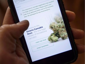 The Ontario Cannabis Store website is pictured on a mobile phone in mid-October.
