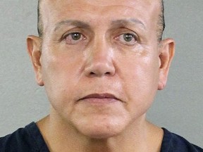 In this undated photo released by the Broward County Sheriff's office, Cesar Sayoc is seen in a booking photo, in Miami.