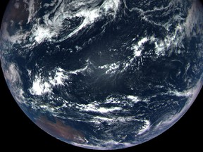 This NASA handout photo released on Sept. 27, 2017 shows a colour composite image of Earth taken on Sept. 22 by the MapCam camera on NASA's OSIRIS-REx spacecraft.