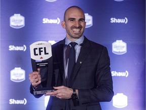 Winner of Most Outstanding Canadian, Ottawa Redblacks receiver Brad Sinopoli, holds his award during the Shaw CFL Awards in Edmonton on Thursday, Nov. 22, 2018.