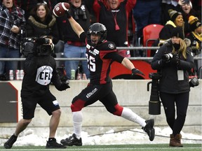 Ottawa Redblacks Brendan Gillanders (25) celebrates a touchdown during second half CFL East Division final action against the Hamilton Tiger-Cats, in Ottawa on Sunday