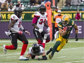 The Ottawa Redblacks' Chris Ackie (5) and Kyries Hebert (34) help chase down the Edmonton Eskimos' Nate Behar. Between the WILL (weakside) and MIKE (middle) linebacker spots, the Redblacks have four guys — Kevin Brown, Avery Williams, Hebert and Ackie — who can each play at a high level.