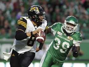 Tiger-Cats quarterback Jeremiah Masoli (8) had to do more for his team because of a spate of injuries to starting receivers, Henry Burris says.