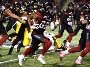 The Ottawa Redblacks' Diontae Spencer runs the ball against the Hamilton Tiger-Cats on Oct. 27, 2017, when he had a CFL-record 496 all-purpose yards.