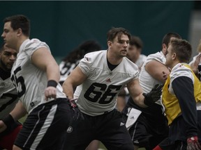 Redblacks offensive lineman Nolan MacMillan (66) takes part in practice in Edmonton on Wednesday.