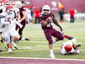 The Gee-Gees' Dawson Odei runs into the end zone for one of his two touchdowns against Guelph on Nov. 3, 2018. Greg Mason photo