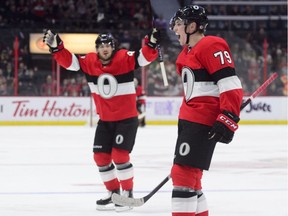 The Ottawa Senators' Drake Batherson (79) celebrates after scoring his first NHL goal in his debut against the Detroit Red Wings in Ottawa on Thursday, Nov. 15, 2018.