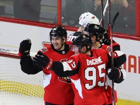 Senators' Colin White celebrates his goal against the New Jersey Devils with Matt Duchene (95)and Mark Stone (61) during second period on Tuesday night. (THE CANADIAN PRESS/Fred Chartrand)