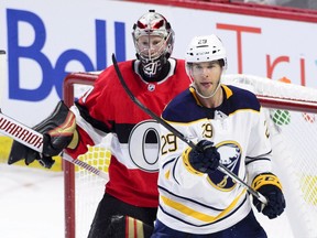 Ottawa Senators goaltender Craig Anderson defends his net against Buffalo Sabres right wing Jason Pominville (29) during first period last night. THE CANADIAN PRESS/Sean Kilpatrick