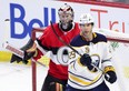 Ottawa Senators goaltender Craig Anderson defends his net against Buffalo Sabres right wing Jason Pominville (29) during first period last night. THE CANADIAN PRESS/Sean Kilpatrick