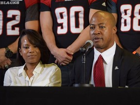 With his wife, Nicole, at his side, Henry Burris officially announced his retirement as a CFL player on Jan. 24, 2017.
