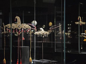 In this Wednesday, Jan. 3, 2018 file photo, some jewels from the famed Al Thani Collection are on display at the 'Treasures of the Mughals and the Maharajahs' exhibition, at Venice's Doge's Palace, in Venice, Italy. (Andrea Merola/ANSA via AP, file)