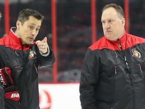 Guy Boucher and Martin Raymond.