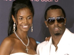 Kim Porter and Sean Combs attend the BET Awards in Los Angeles on June 27, 2006.