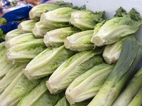 Romaine lettuce is seen at market in Montreal on Thursday, November 22, 2018. Restaurants and grocery stores in Canada have not officially been told to pull their stocks of romaine lettuce, but an ongoing outbreak of E.coli is prompting many to do just that.