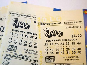 A lotto Max ticket is shown in Toronto on Monday Feb. 26, 2018.