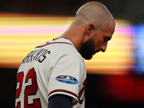 Atlanta Braves' Nick Markakis reacts after flying out to the Los Angeles Dodgers during the seventh inning in Game 4 of baseball's National League Division Series, Monday, Oct. 8, 2018, in Atlanta.