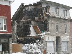 Magee House on Wellington Street after a overnight snow storm in Ottawa Friday Nov 17, 2018.