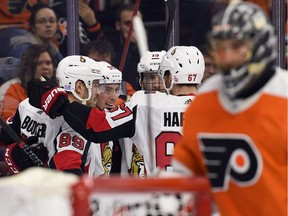 The Ottawa Senators' Matt Duchene, second from left, is congratulated by teammates after his amazing goal against the Flyers on Tuesday, Nov. 27, 2018, in Philadelphia. The Senators won 4-3.