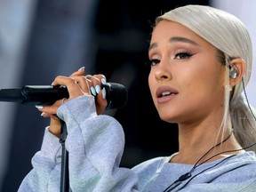 FILE - In this March 24, 2018 file photo, Ariana Grande performs "Be Alright" during the "March for Our Lives" rally in support of gun control in Washington. Grande has released her first song since a 2017 terrorist attack during her concert in the United Kingdom. The 24-year-old posted a video of "No Tears Left to Cry" on Instagram on Friday, April 20, 2018. The emotional song includes the lyrics: "Right now I'm in a state of mind/ I wanna be in like all the time/ Ain't got no tears left to cry/ So I'm pickin' it up, I'm pickin' up."