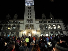 Community members hold candles at a vigil for the victims of the Pittsburgh Synagogue shooting at Cambridge City Hall in Cambridge, Massachusetts on October 30, 2018. (Joseph Prezioso/AFP/Getty Images)