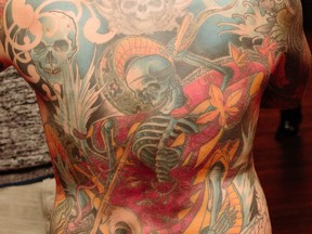 Chris Wenzel is shown in this undated handout image. The well-known Saskatoon tattoo artist asked that his ink-adorned skin be removed and preserved before he was buried.