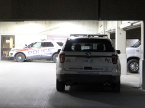 Kingston Police vehicles sit outside Kingston General Hospital following a shooting in the emergency department on Tuesday night. Steph Crosier/Postmedia