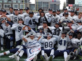 Jacob Hespeler High School from Cambridge celebrates after winning the Central Bowl at TD Place on Wednesday, Nov. 29, 2018. Kendra Read
