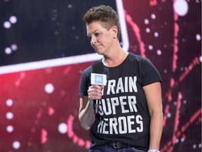 An emotional Tina Boileau, mother of Jonathan Pitre, takes to the stage as WE Day takes place at Canadian Tire Centre in Ottawa to unite young change-makers with world-renowned speakers and performers. A celebration of making doing good, doable, WE Day is a series of 19 stadium sized events held across Canada, the U.S., the U.K. and the Caribbean, as well as WE Day Connect, an interactive, online event accessible to students across the globe. Students in attendance can't buy a ticket--they earn their way by taking action on one local and one global issue, creating lasting social change in their communities. This past year, more than 200,000 students from over 10,000 schools attended WE Day events, alongside thousands who watched online and millions more through two national North American TV broadcasts Photo by Wayne Cuddington/ Postmedia