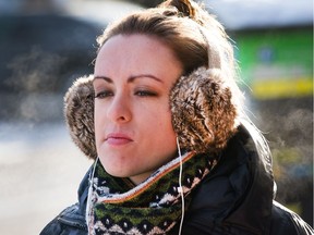 Pedestrians brave the cold.