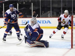 Robin Lehner of the Islanders makes a save against the Senators in a game on Dec. 28.