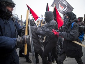 Opposing groups were on Parliament Hill on Saturday over government plans to ratify a UN pact on migration. Nine people were arrested, but only one was charged with assaulting a police officer.