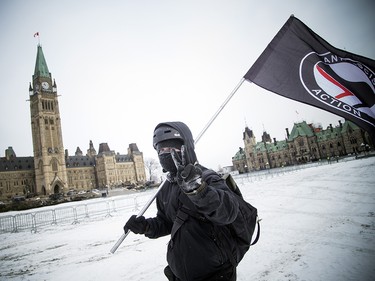 Groups opposed to Canada’s support of the UN Global Compact for Safe, Orderly and Regular Migration held a rally to protest the United Nation Global Compact for Migration while anti-fascism and anti-racism activists counter-protested, Saturday, Dec. 8, 2018 on Parliament Hill.