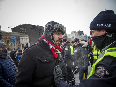 Groups opposed to Canada’s support of the UN Global Compact for Safe, Orderly and Regular Migration held a rally to protest the United Nation Global Compact for Migration while anti-fascism and anti-racism activists counter-protested, Saturday, Dec. 8, 2018 on Parliament Hill. Anti-fascism and anti-racism activists clash with RCMP and PPS authorities.