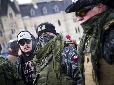 Groups opposed to Canada’s support of the UN Global Compact for Safe, Orderly and Regular Migration held a rally to protest the United Nation Global Compact for Migration while anti-fascism and anti-racism activists counter-protested, Saturday, Dec. 8, 2018 on Parliament Hill. The far-right groups had their own added security detail with them Saturday.