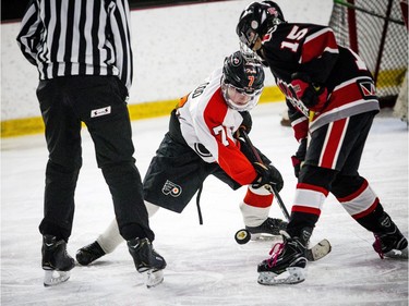 The Major Atom AAA Philadelphia Little Flyers played the Nepean Raiders at the Bell Sensplex Saturday December 29, 2018, part of the Bell Capital Cup. Philadelphia Little Flyers #7 Sam Flood and Nepean Raiders #15 Max Mews face off.