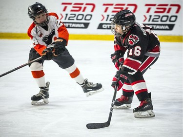 The Major Atom AAA Philadelphia Little Flyers played the Nepean Raiders at the Bell Sensplex Saturday December 29, 2018, part of the Bell Capital Cup. Nepean Raiders #16 Thomas Vandenberg brings the puck down the ice.