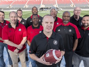 Ottawa Redblacks's Head Coach Rick Campbell with his coaching staff. March 2018.