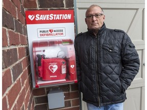 Chris Troughton, a cardiac arrest survivor, is donating an AED to his neighbourhood. He is fundraising with his neighbours for a SaveStation (fully monitored, outdoor 24/7 public access AED cabinet) to be placed on the side of his Kanata home. November 30, 2018. Errol McGihon/Postmedia