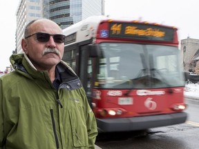 Mike Deriger lost an eye in an incident on an OC Transpo bus in December 2015 as the bus was going from Gatineau to Ottawa. Mike poses for a photo where the incident took place as a bus drives by. December 6, 2018.