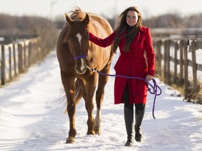 Emily Bertrand walks with her horse Fred at the Royale Equestrian Centre.