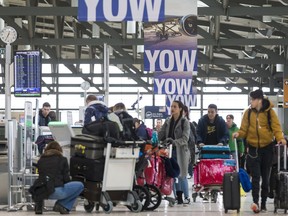 The number of passengers arriving and departing on Friday at the Ottawa International Airport was expected to be more than double an average day.