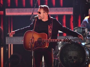 Eric Church performs "Desperate Man" at the 52nd annual CMA Awards at Bridgestone Arena on Wednesday, Nov. 14, 2018, in Nashville, Tenn.