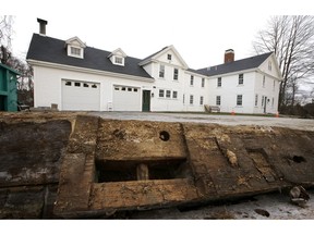 n this Thursday, Dec. 13, 2018 photo, a discarded beam rests in the driveway of the home where Sarah Clayes lived, in Framingham, Mass., after leaving Salem, Mass., following the 1692 witch trials. Clayes was jailed during the witch trials but was freed in 1693 when the hysteria died down.