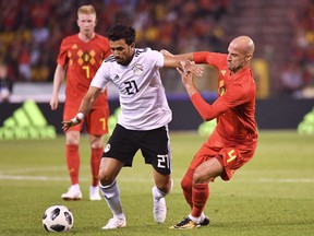 Belgium's Laurent Ciman (right) joins Toront FC (AP)