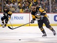 Pittsburgh Penguins Kris Letang controls the puck in Game Four of the Eastern Conference Second Round during the 2018 NHL Stanley Cup Playoffs against the Washington Capitals at PPG PAINTS Arena on May 3, 2018 in Pittsburgh. (Kirk Irwin/Getty Images)