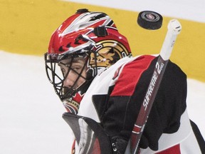 Ottawa Senators goaltender Mike McKenna makes a save against the Montreal Canadiens in the second period on Saturday.
