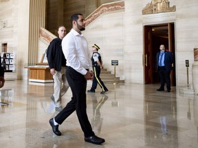 Awso Peshdary walks through the foyer of the Supreme Court of Canada before a hearing in August.