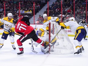 Ottawa Senators centre Chris Tierney attempts to score on Nashville Predators goaltender Juuse Saros last night. THE CANADIAN PRESS