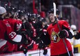 Senators rookie forward Brady Tkachuk is congratulated at the bench after scoring a first period goal against the Nashville Predators in Ottawa on Monday night. (Sean Kilpatrick/The Canadian Press)